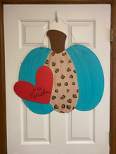 Load image into Gallery viewer, Large 24 inch bumpy pumpkin door hanger that is teal and leopard in color.